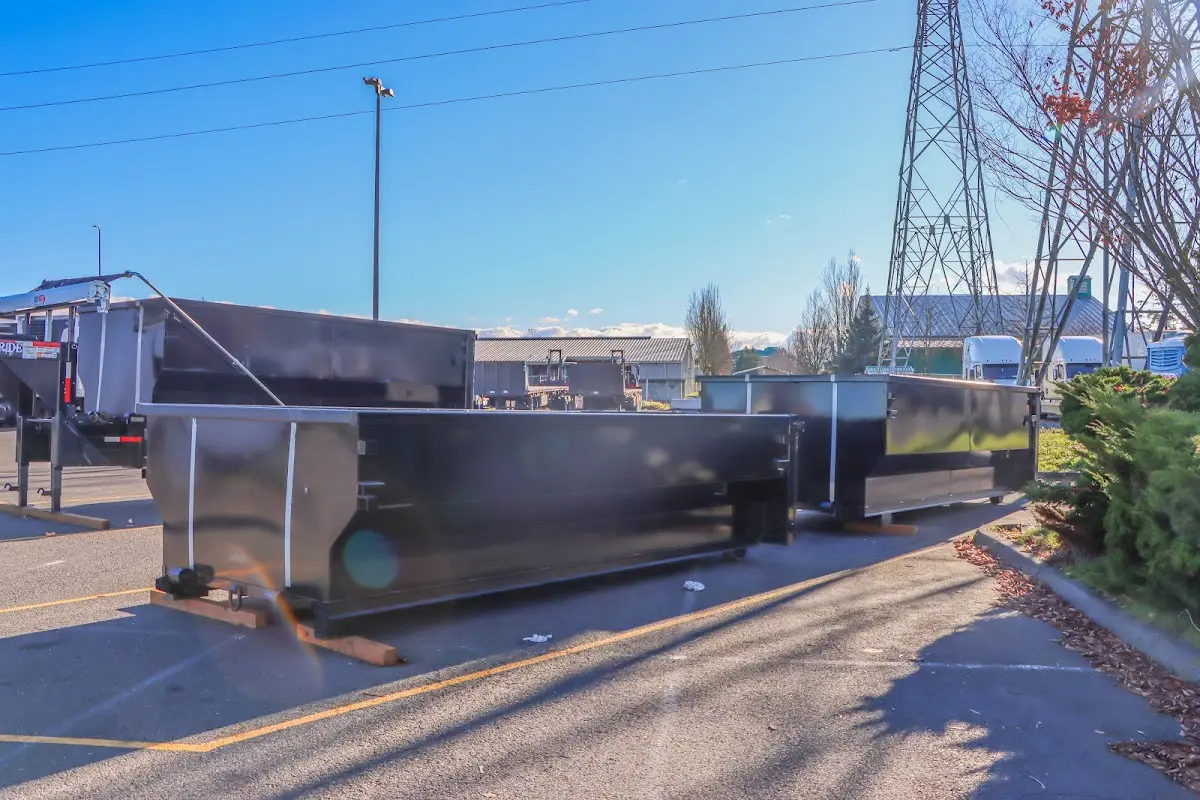 Roll-off dumpster ready for waste disposal at job site for 15 Yard Dumpster Rental in Bel Air South